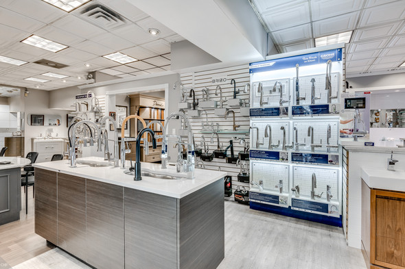 Large selection of Grohe showerheads and faucets on display in Consumer Supply showroom
