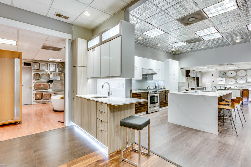 Consumers Supply kitchen showroom featuring modern cabinetry