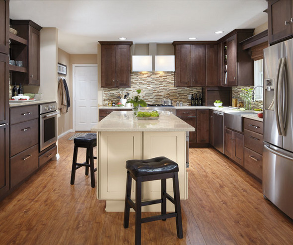 Rustic kitchen with dark wood cabinets and a white island