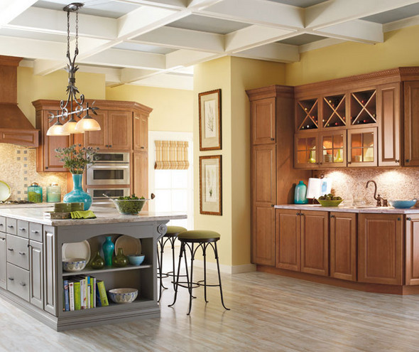 Kitchen with traditional wooden cabinetry and a grey island