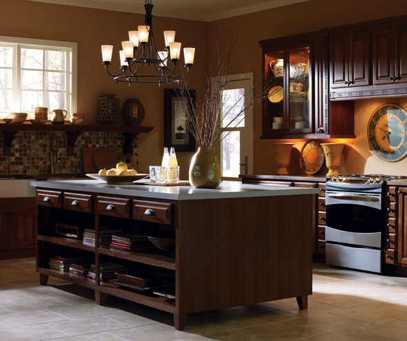 Oversized kitchen island with dark rustic cabinets