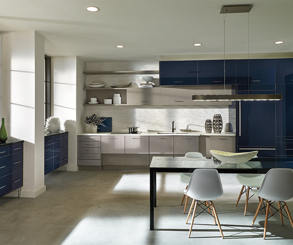 Modern kitchen with alternating blue, white and grey cabinetry