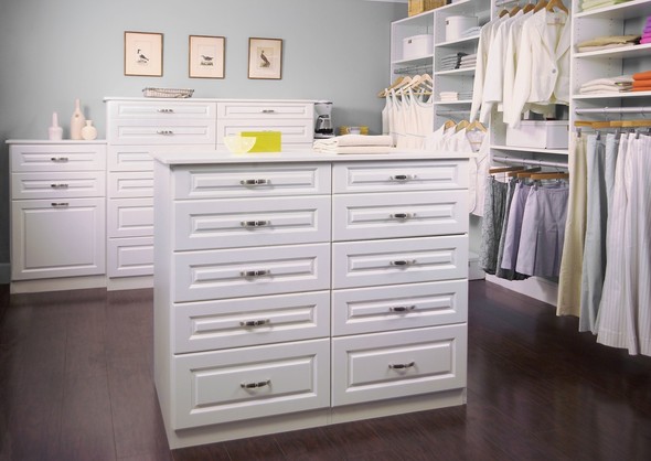 Traditional white cabinet inside a walk-in closet