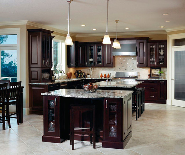 Open kitchen with dark cherry cabinets and two islands