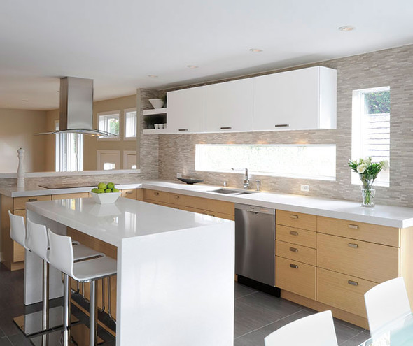 Kitchen with oak and gloss white cabinets and white island